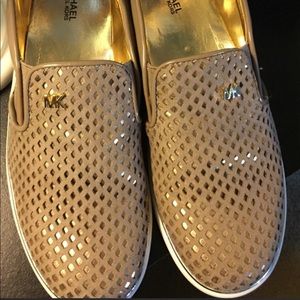 Michael Kors slip on shoes.